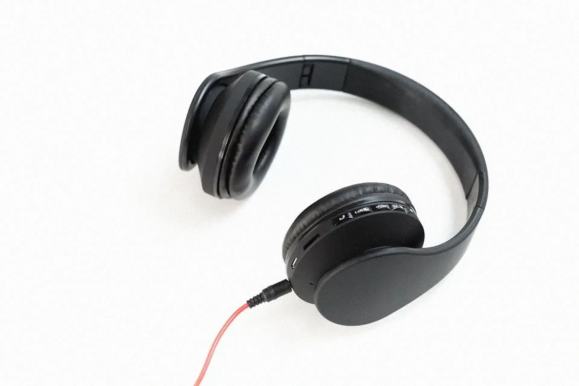 Black headphones on a white background