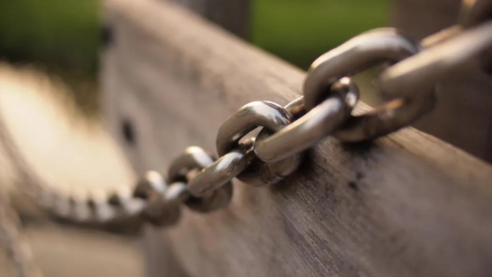 A close-up of a metal chain link